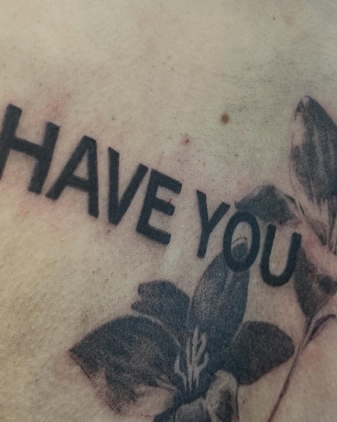 Tattoo by @hhunter.ttt — lettering_script, black_and_grey