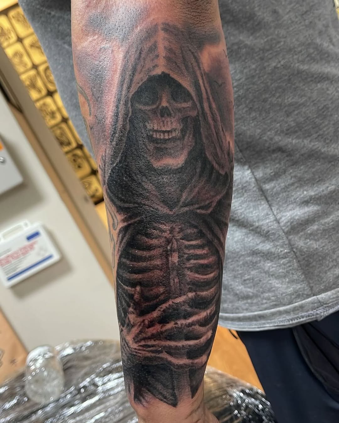 Tattoo by @tobiaztattooz — dark_realism, black_and_grey