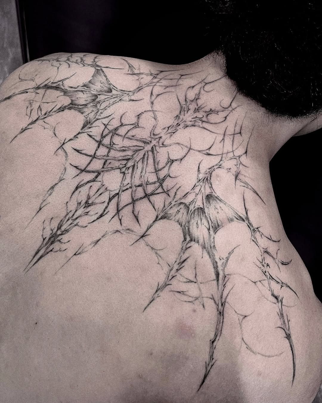 Tattoo by @rayzhu.tattoo — blackwork, dark_realism