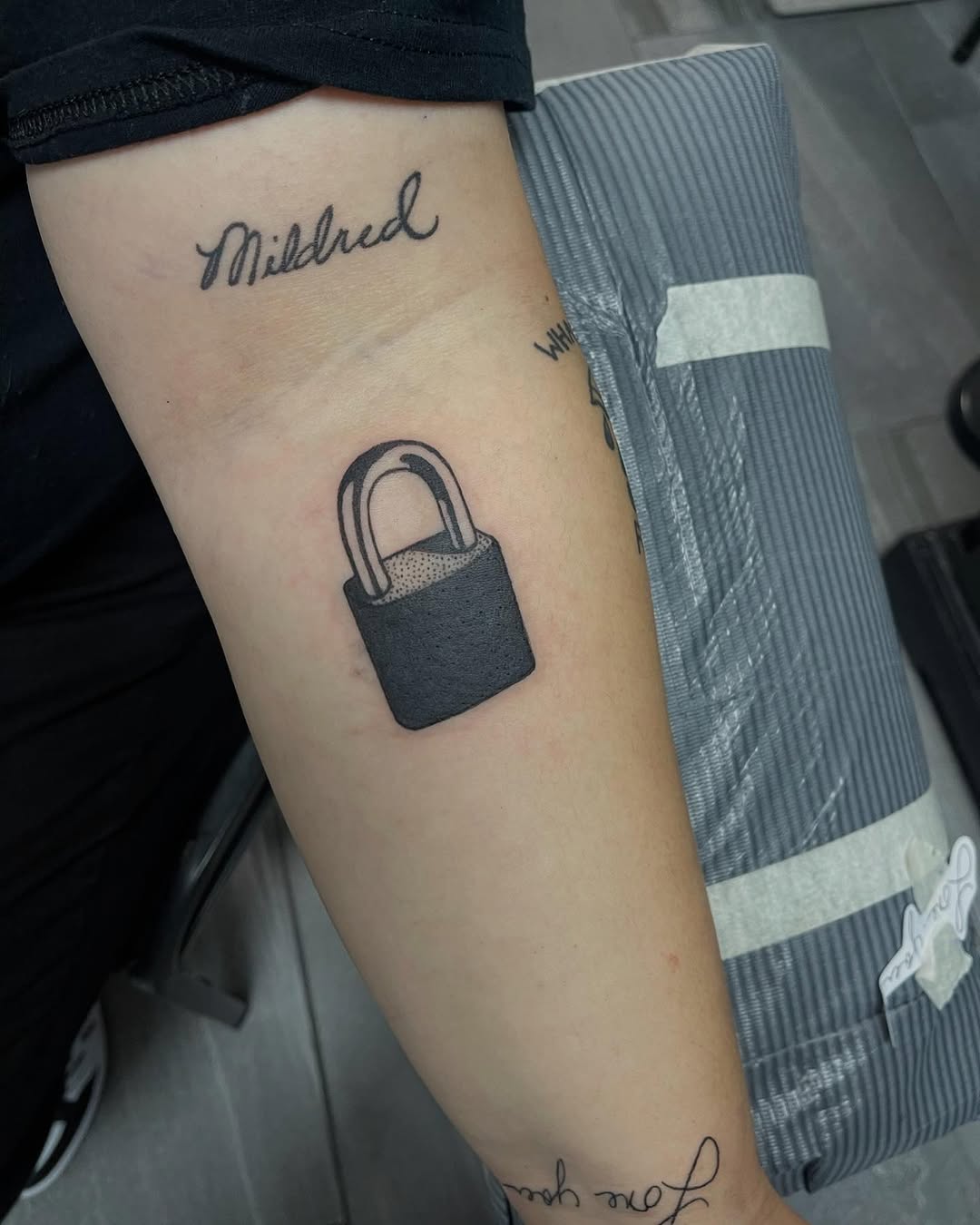 Tattoo by @miznola — lettering_script, blackwork