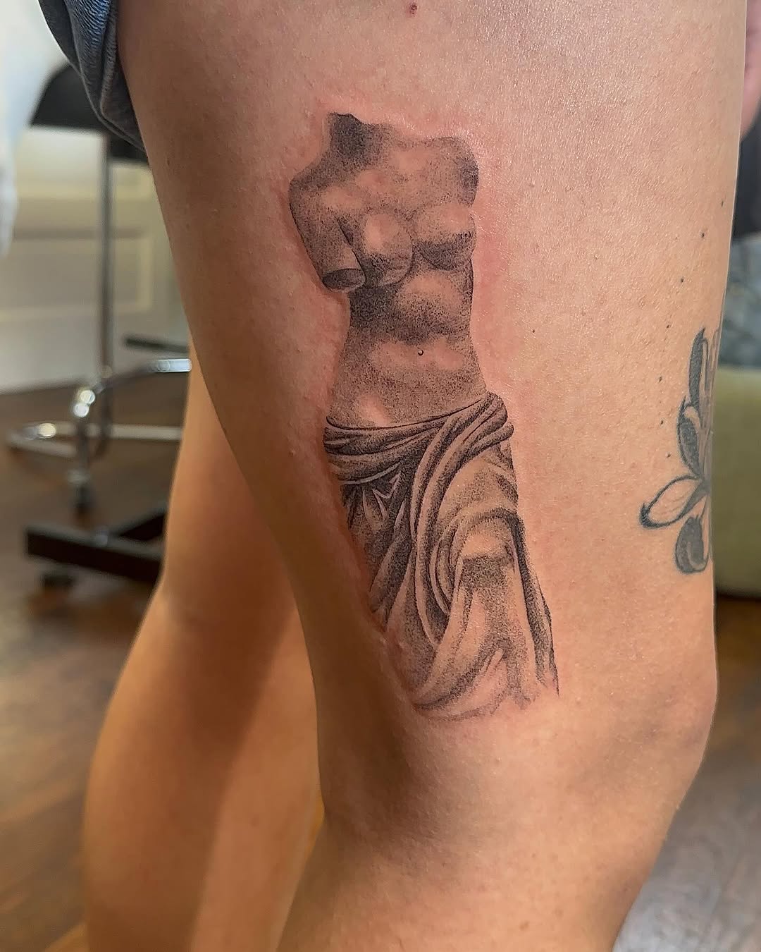 Tattoo by @bboujeeink2 — black_and_grey, realism