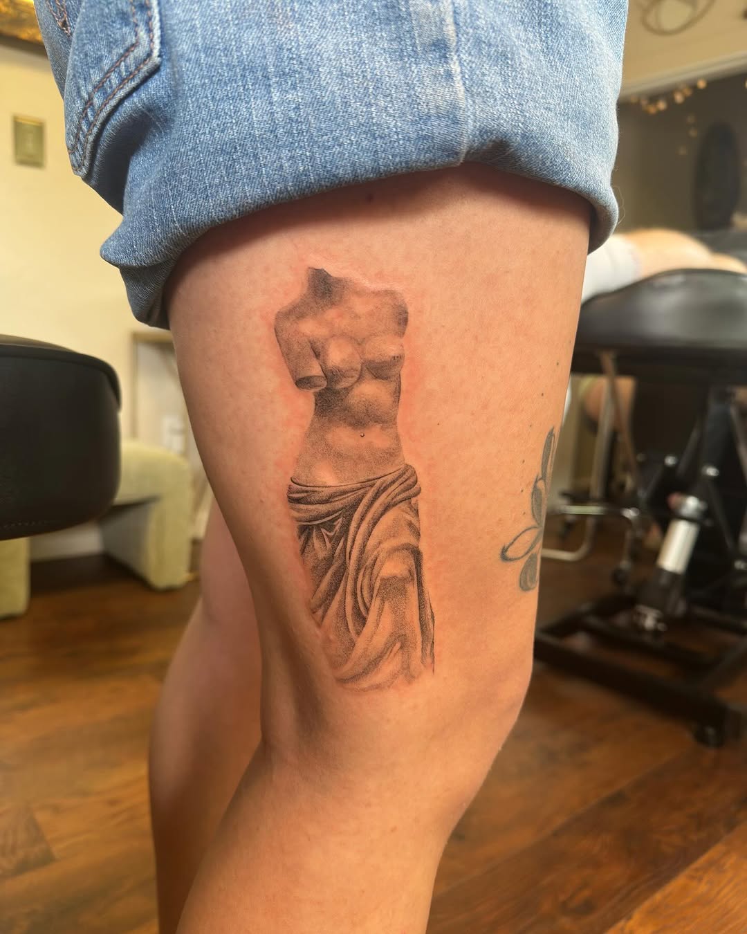 Tattoo by @bboujeeink2 — realism, black_and_grey
