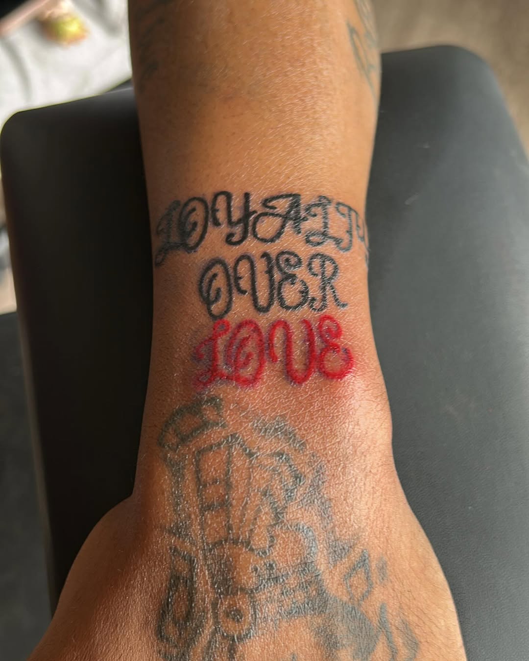 Tattoo by @702tattoo — lettering_script, chicano