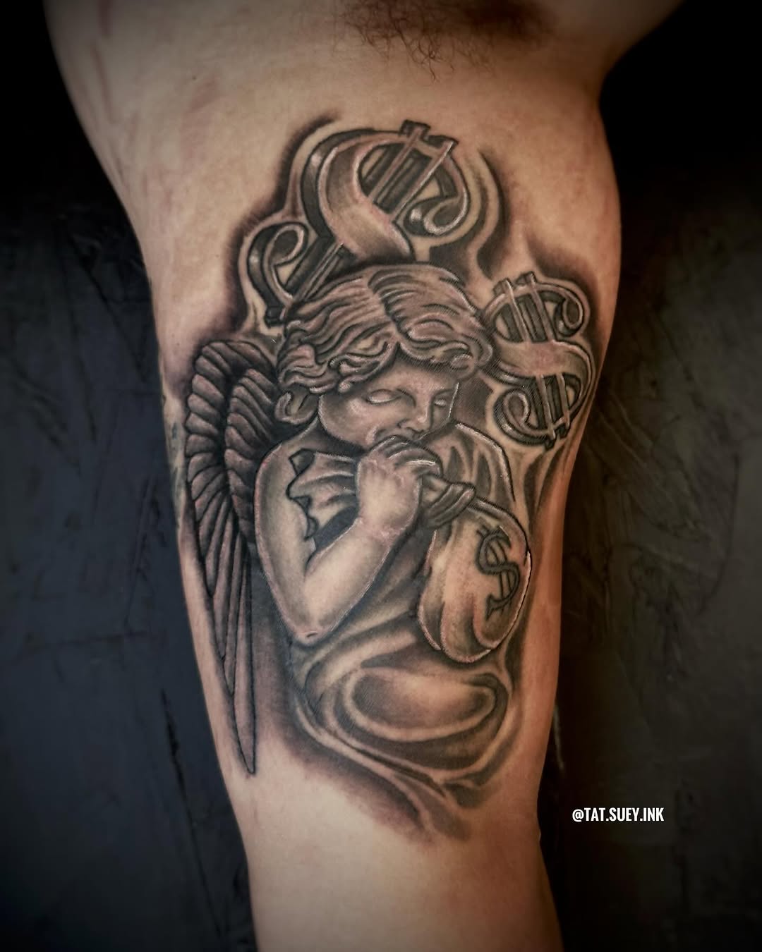 Tattoo by @tat.suey.ink — black_and_grey, realism