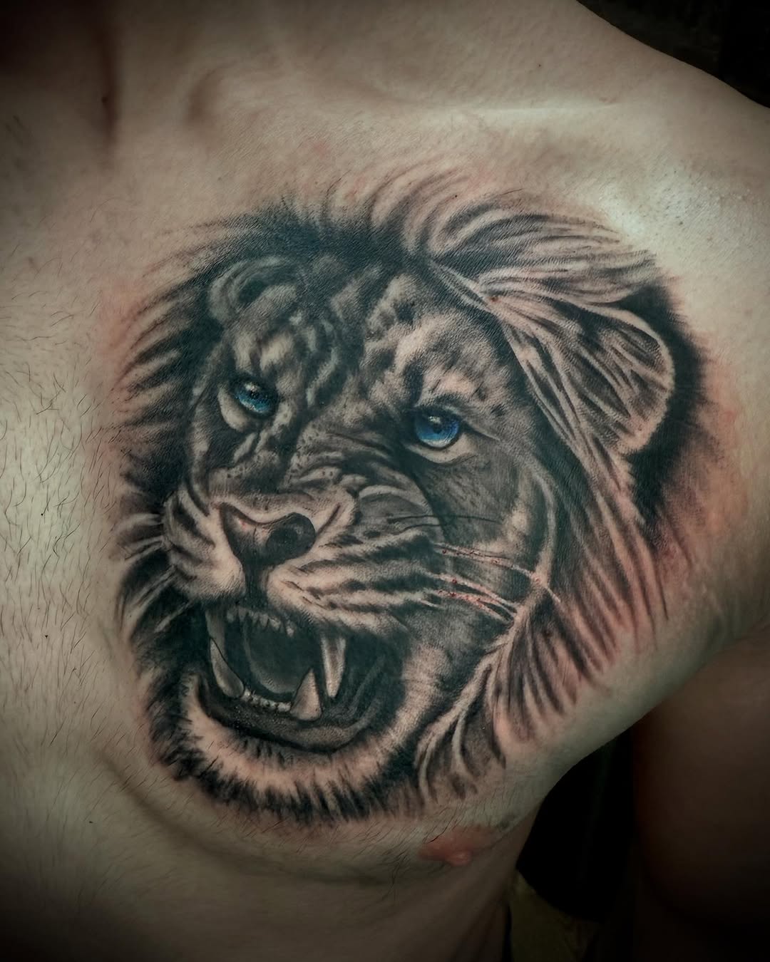 Tattoo by @fazo9122 — realism, black_and_grey