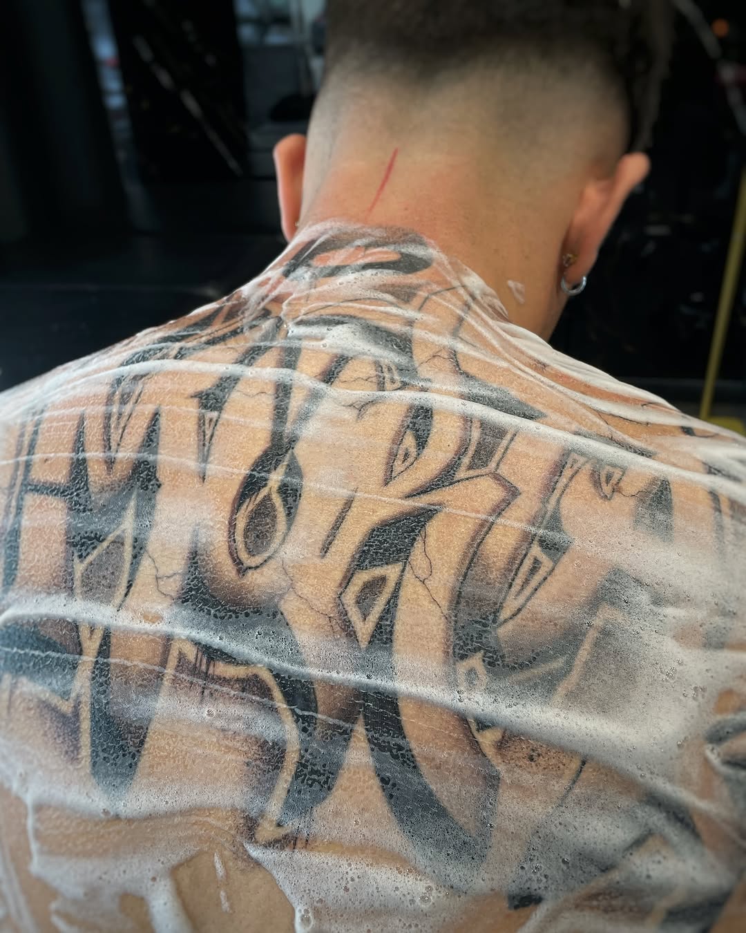 Tattoo by @blot_tattoo — lettering_script, blackwork
