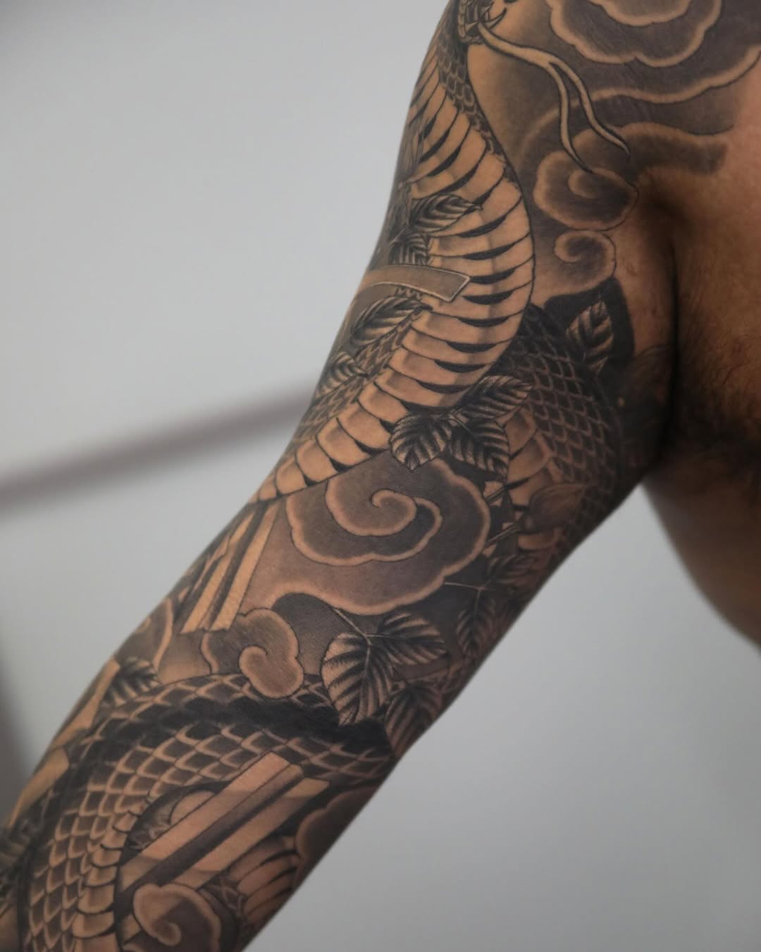 Tattoo by @hunter.schuon.tattoo — japanese_irezumi, black_and_grey
