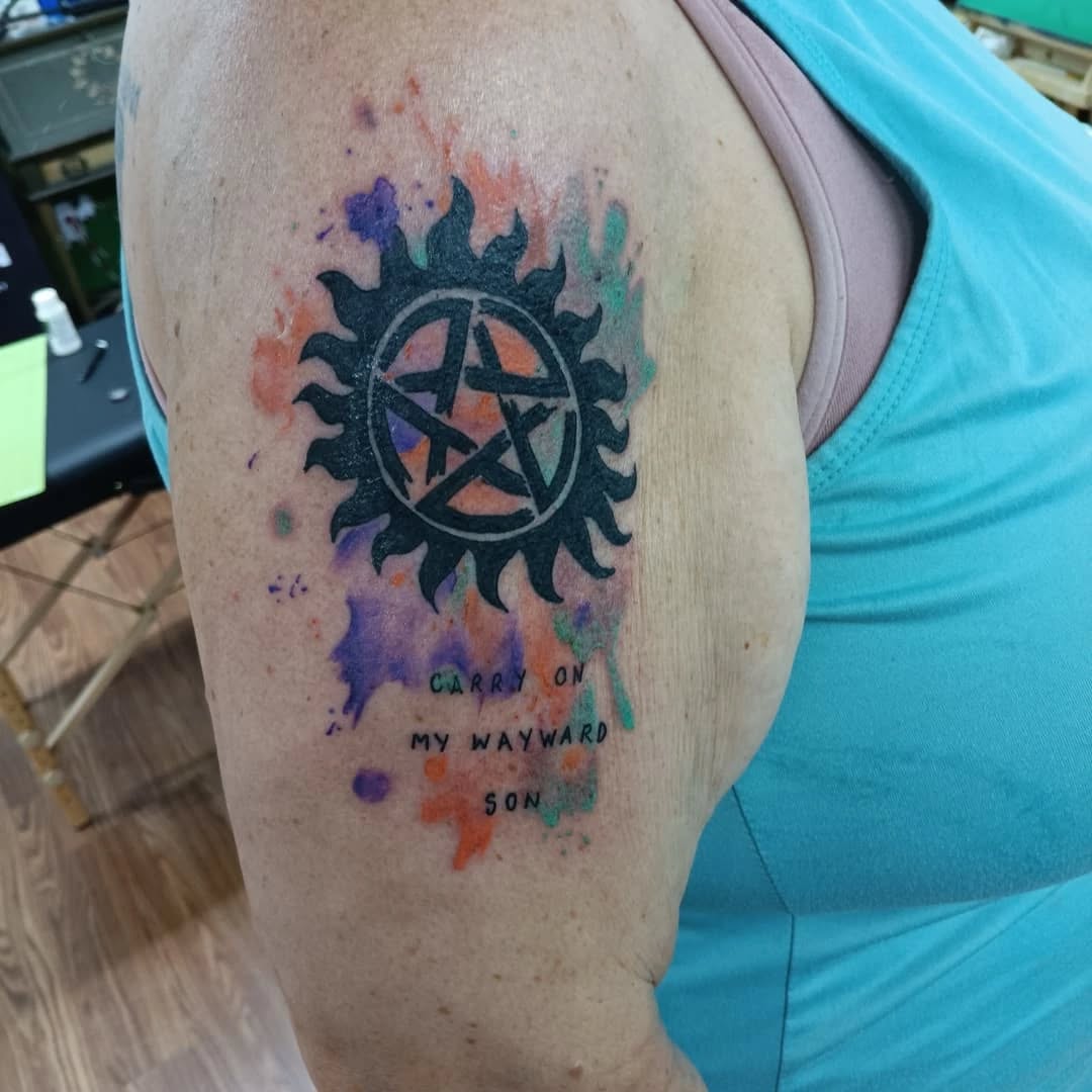 Tattoo by @speedy_tattz — blackwork, watercolor