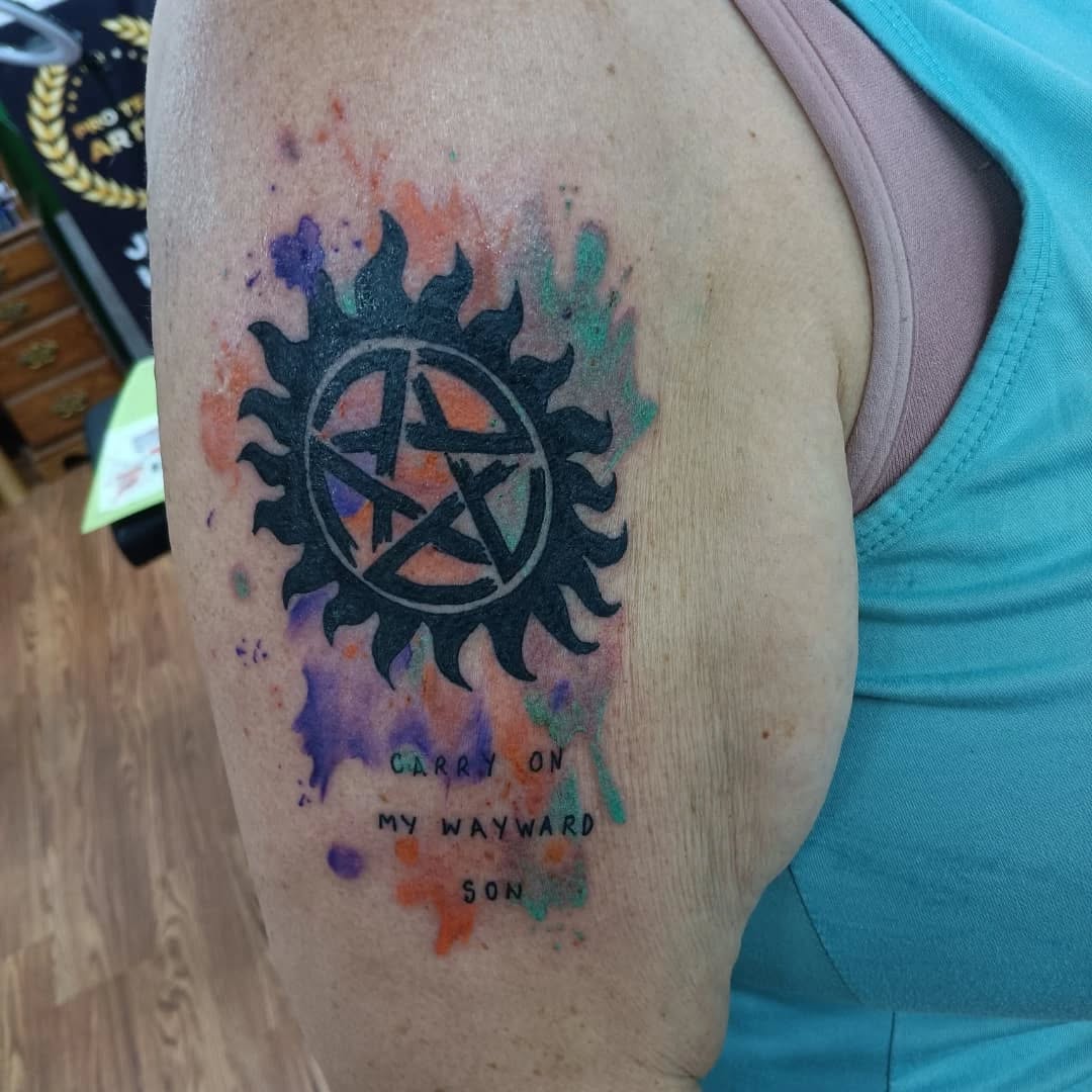 Tattoo by @speedy_tattz — blackwork, watercolor