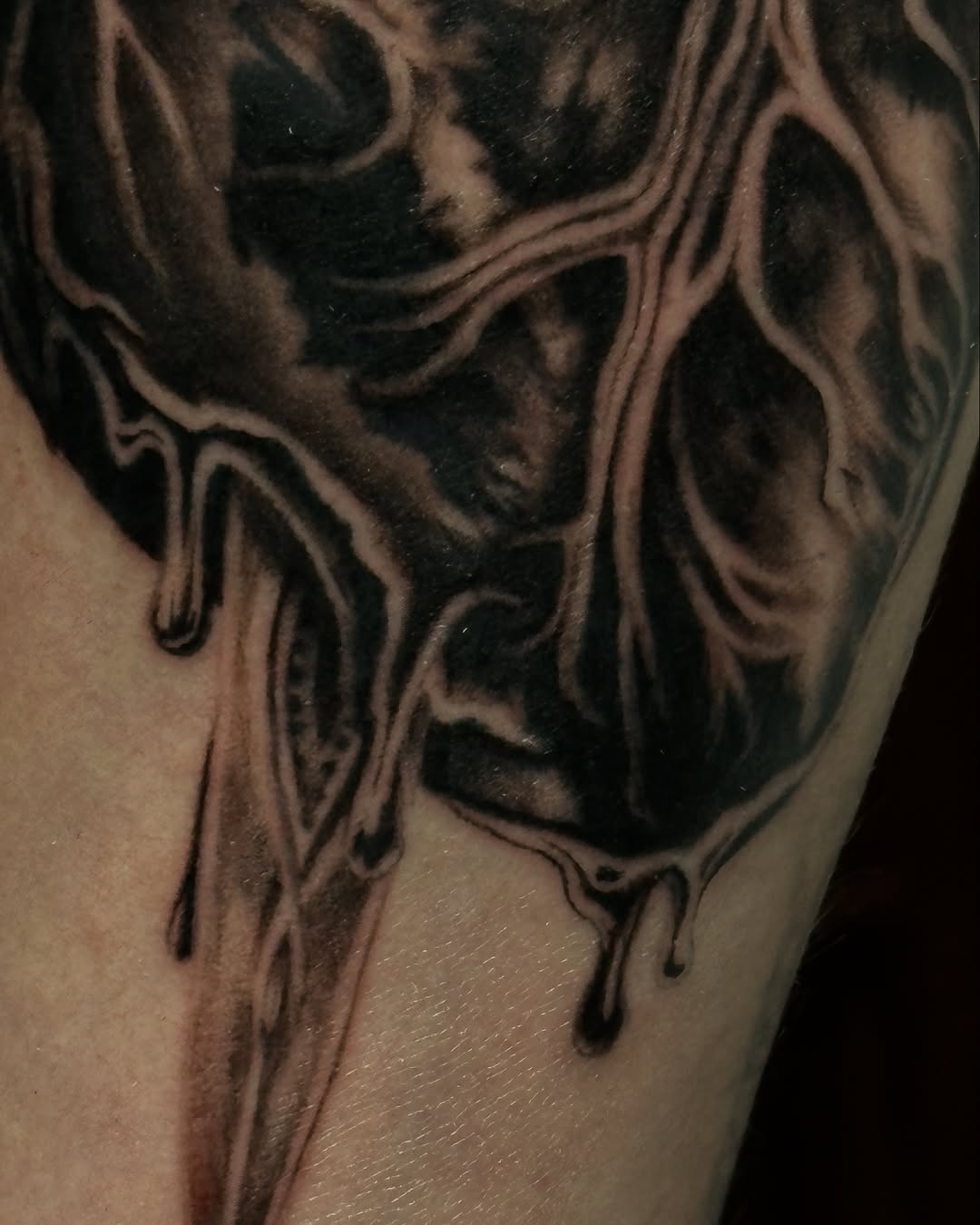 Tattoo by @kay.b.tats — black_and_grey, dark_realism