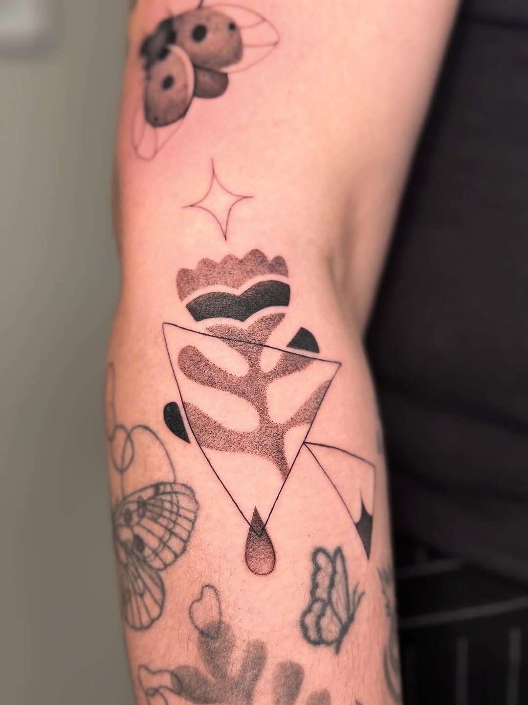 Tattoo by @whitestarling.tattoo — dotwork, geometric
