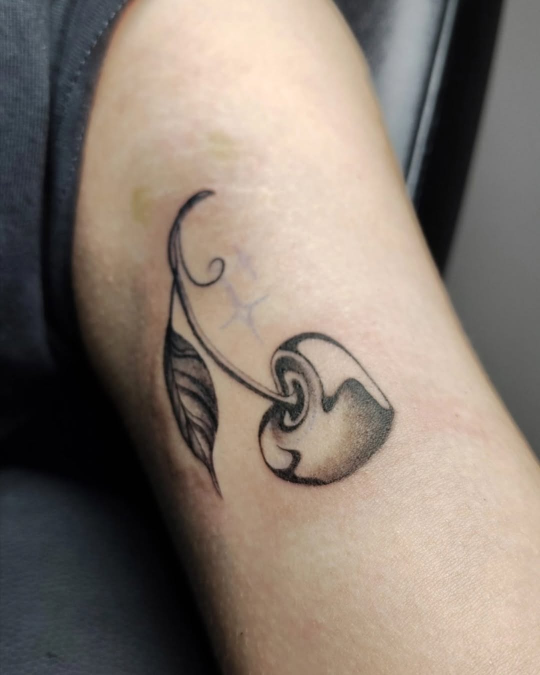 Tattoo by @inkw.ivy — black_and_grey, fine_line