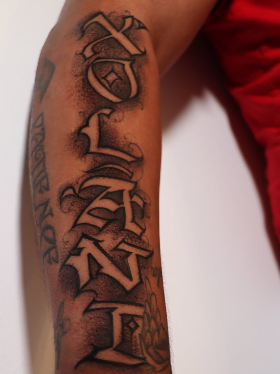 Tattoo by @tat_papi — lettering_script, chicano