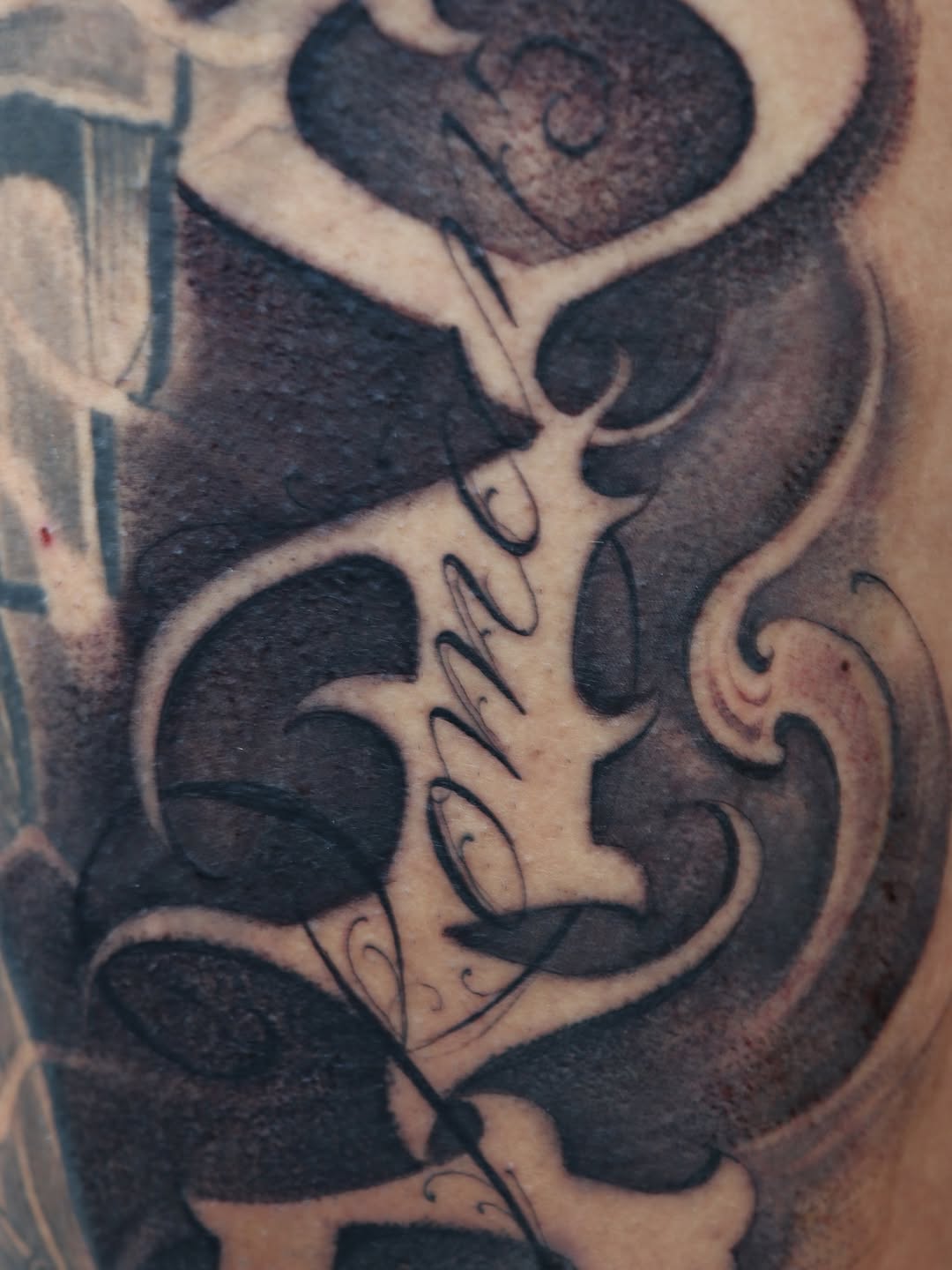 Tattoo by @tat_papi — lettering_script, black_and_grey