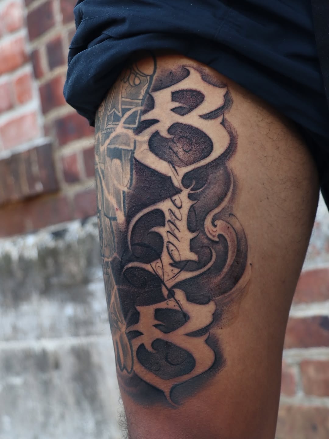 Tattoo by @tat_papi — lettering_script, black_and_grey