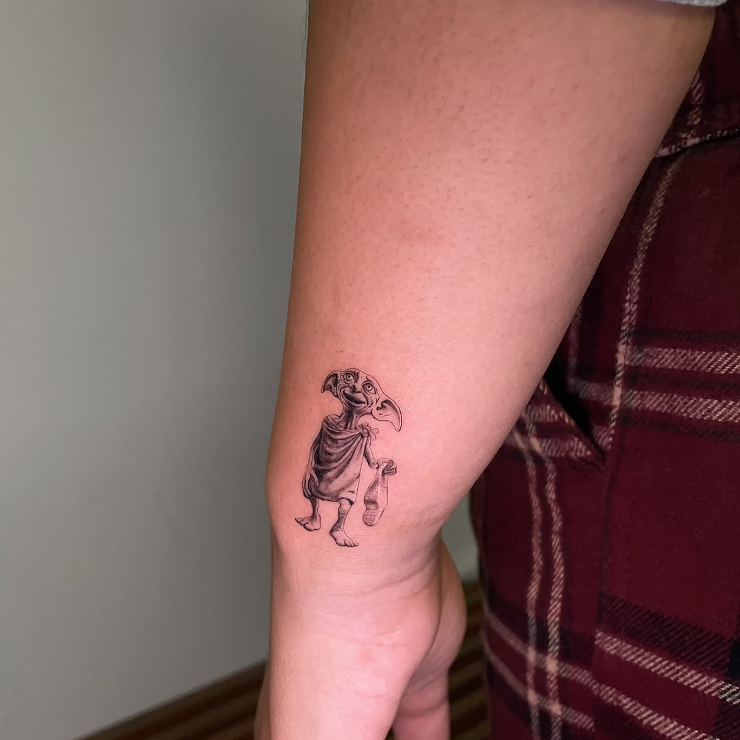 Tattoo by @sayhello.ink โ realism, black_and_grey