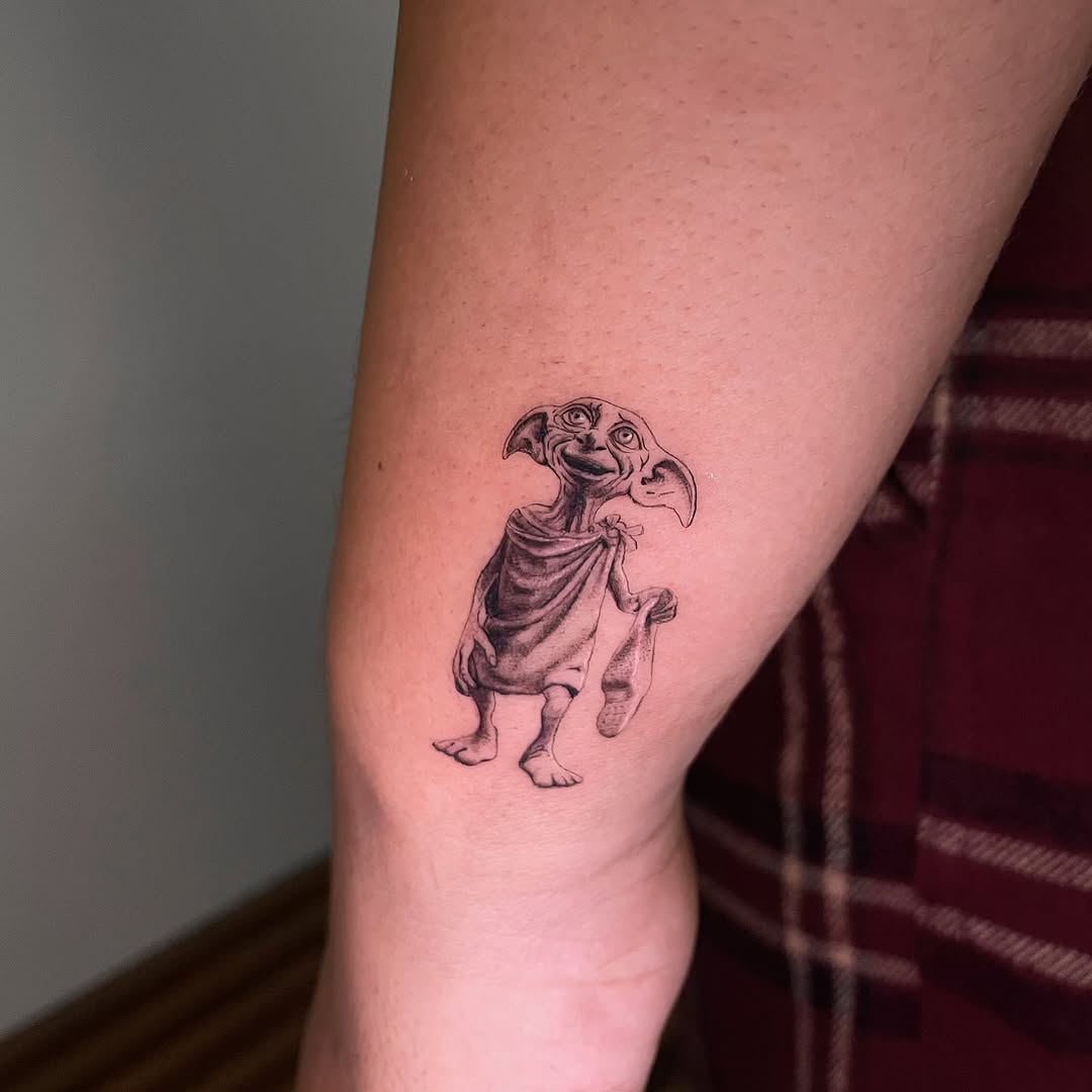 Tattoo by @sayhello.ink โ realism, black_and_grey