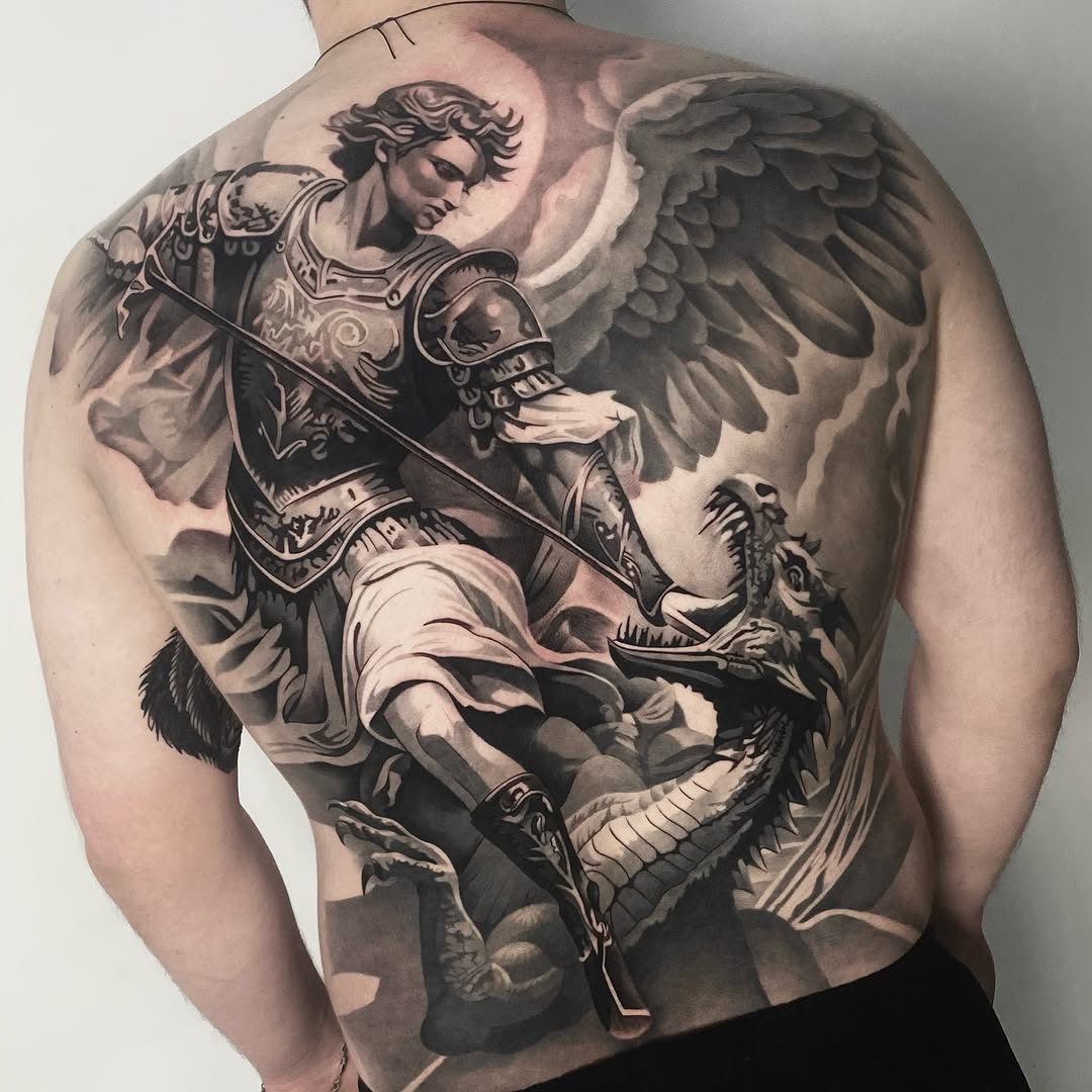 Tattoo by @vudi_tattoo — realism, black_and_grey