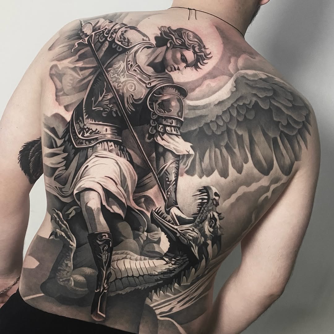 Tattoo by @vudi_tattoo — realism, black_and_grey