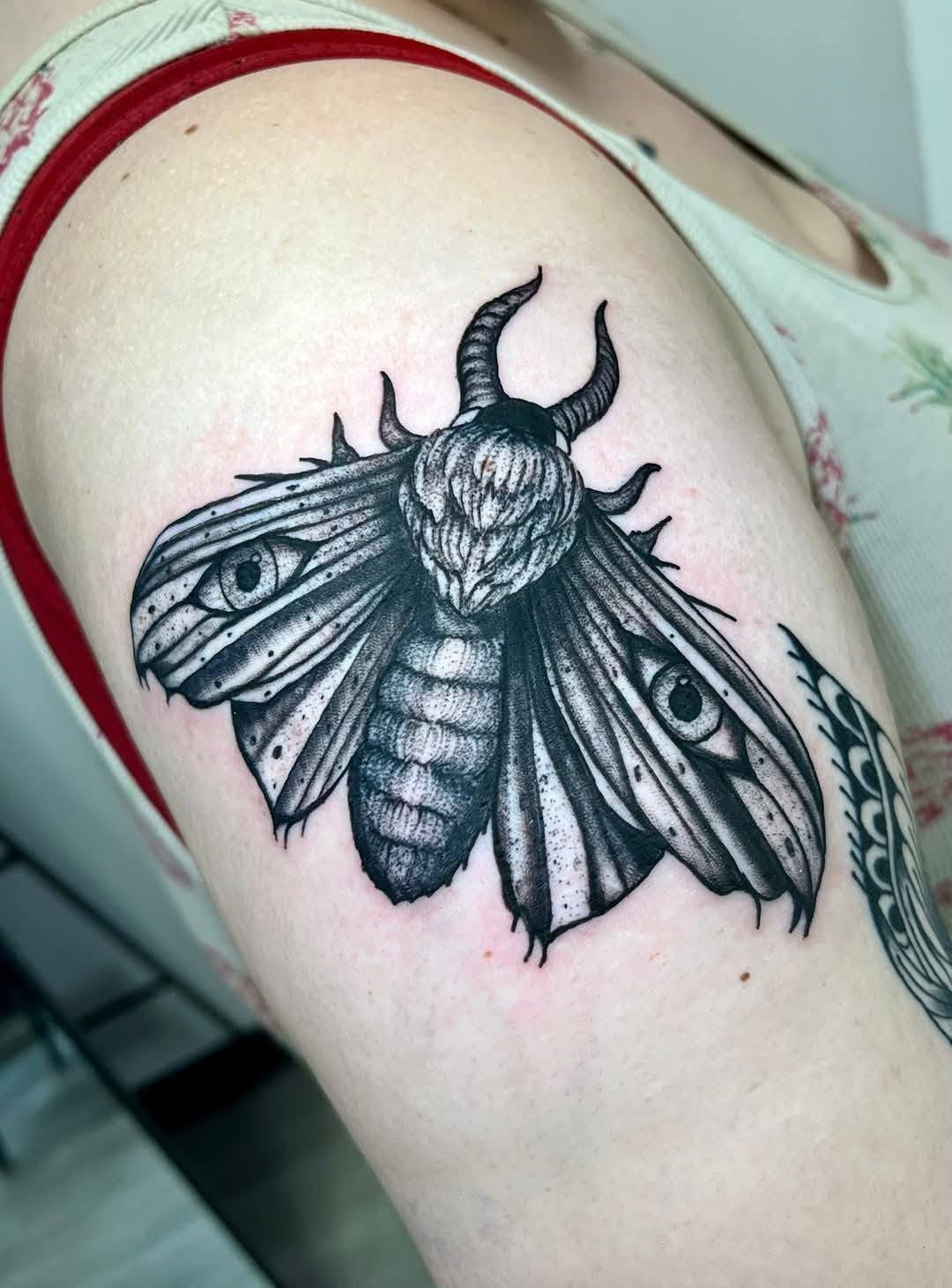 Tattoo by @c_lupori — black_and_grey, dark_realism