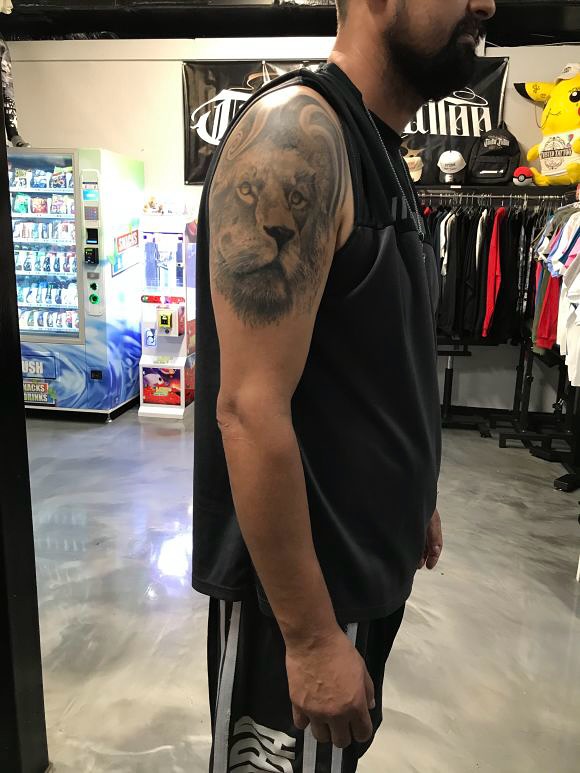 Tattoo by @tattoosbyraul — realism, black_and_grey