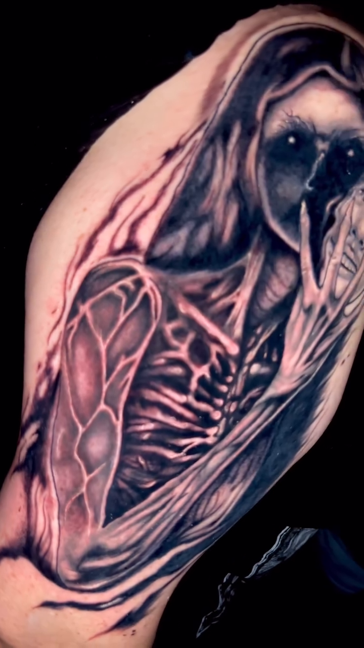 Tattoo by @tattoosbygunner — dark_realism, black_and_grey