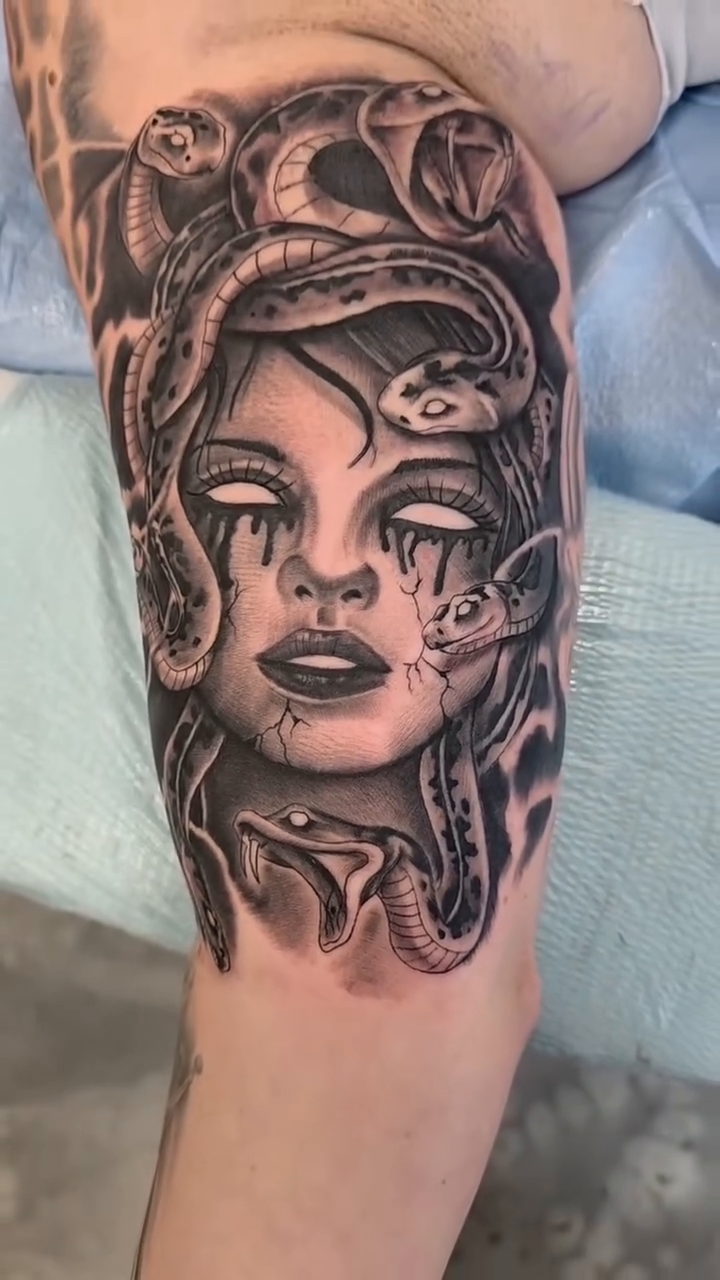 Tattoo by @oh_my_goad — realism, black_and_grey
