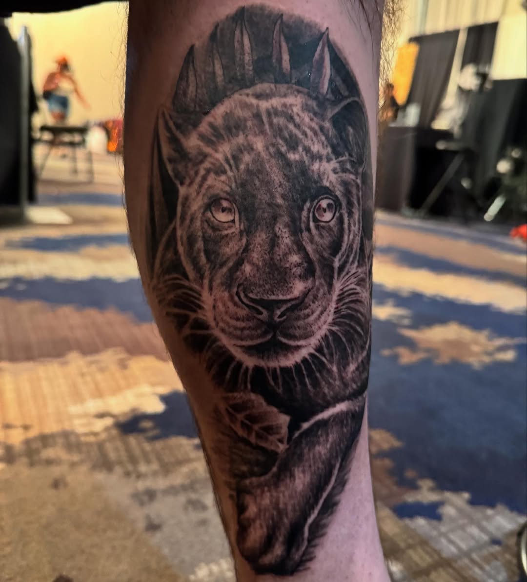 Tattoo by @tattoosbyfesik โ realism, black_and_grey