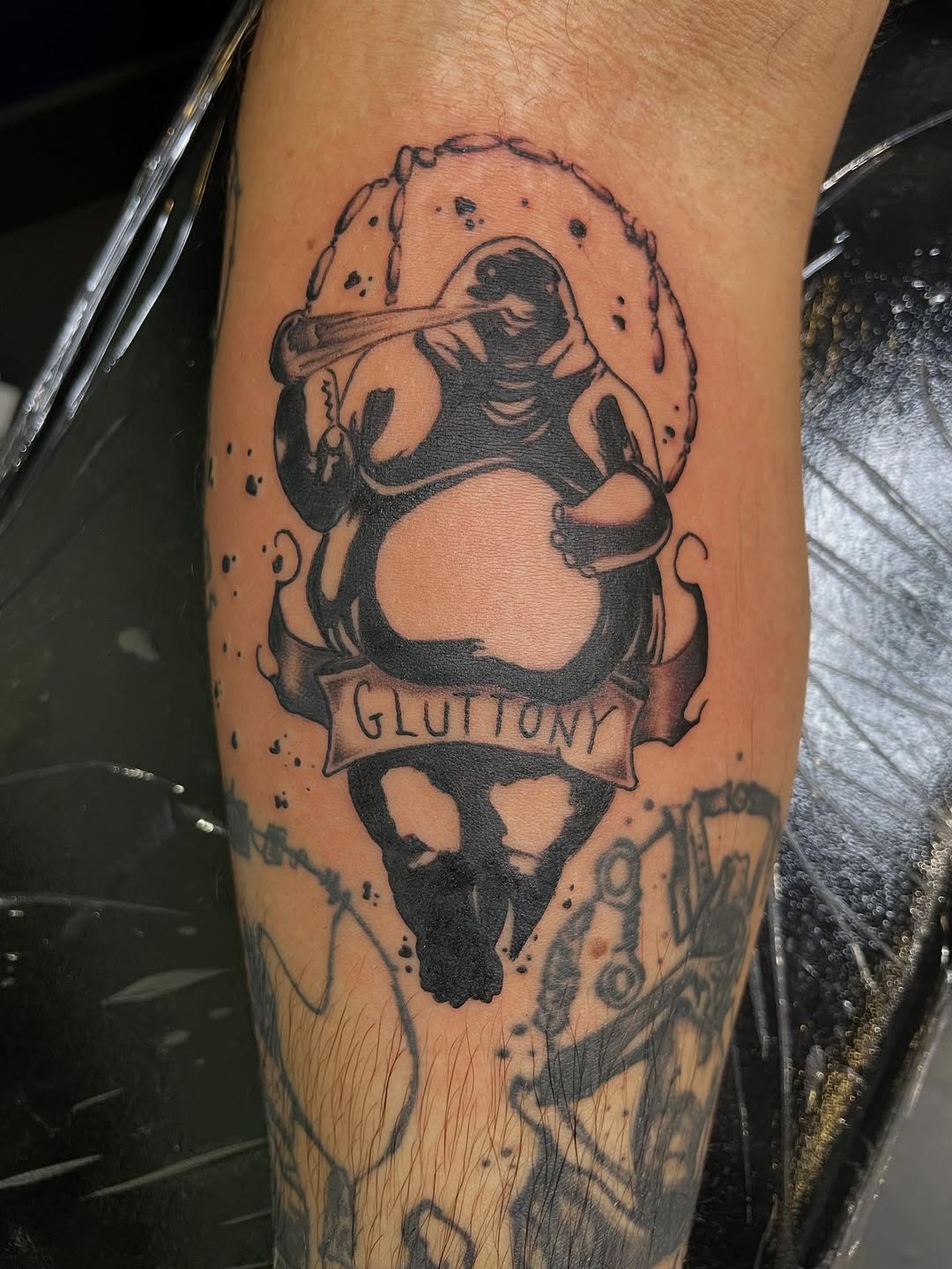 Tattoo by @bodymods_by_b — blackwork, lettering_script