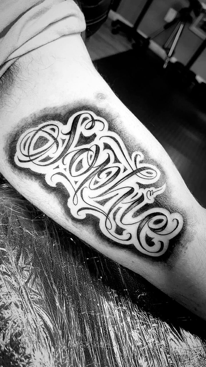 Tattoo by @jokertattoos — lettering_script