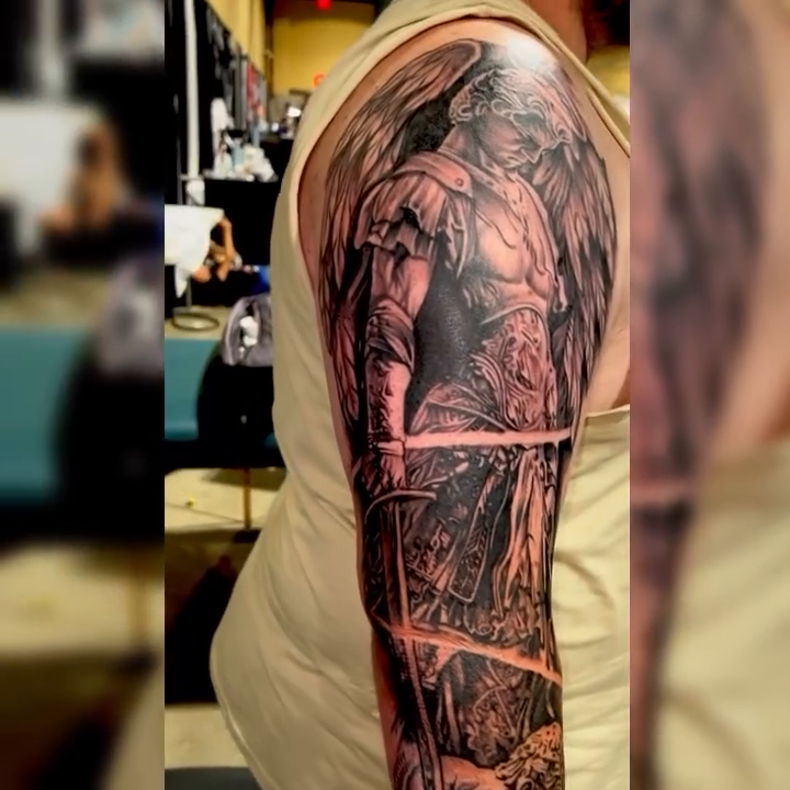 Tattoo by @sanchez_ink — dark_realism, black_and_grey