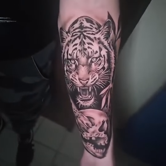 Tattoo by @jaz.ravenink โ realism, black_and_grey