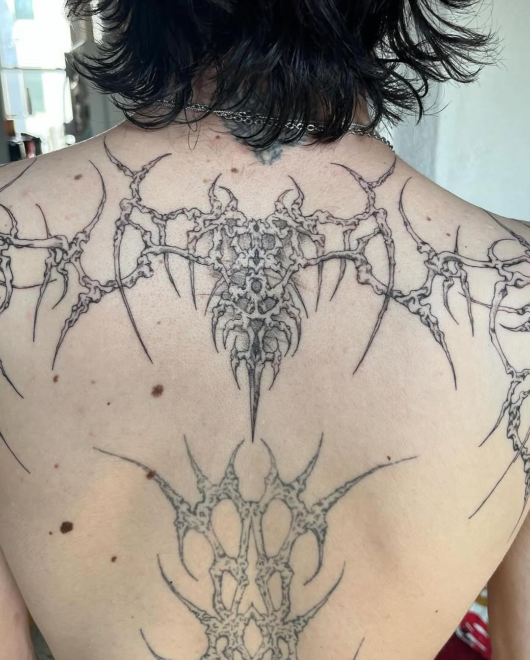 Tattoo by @initiationoftorture — blackwork, geometric