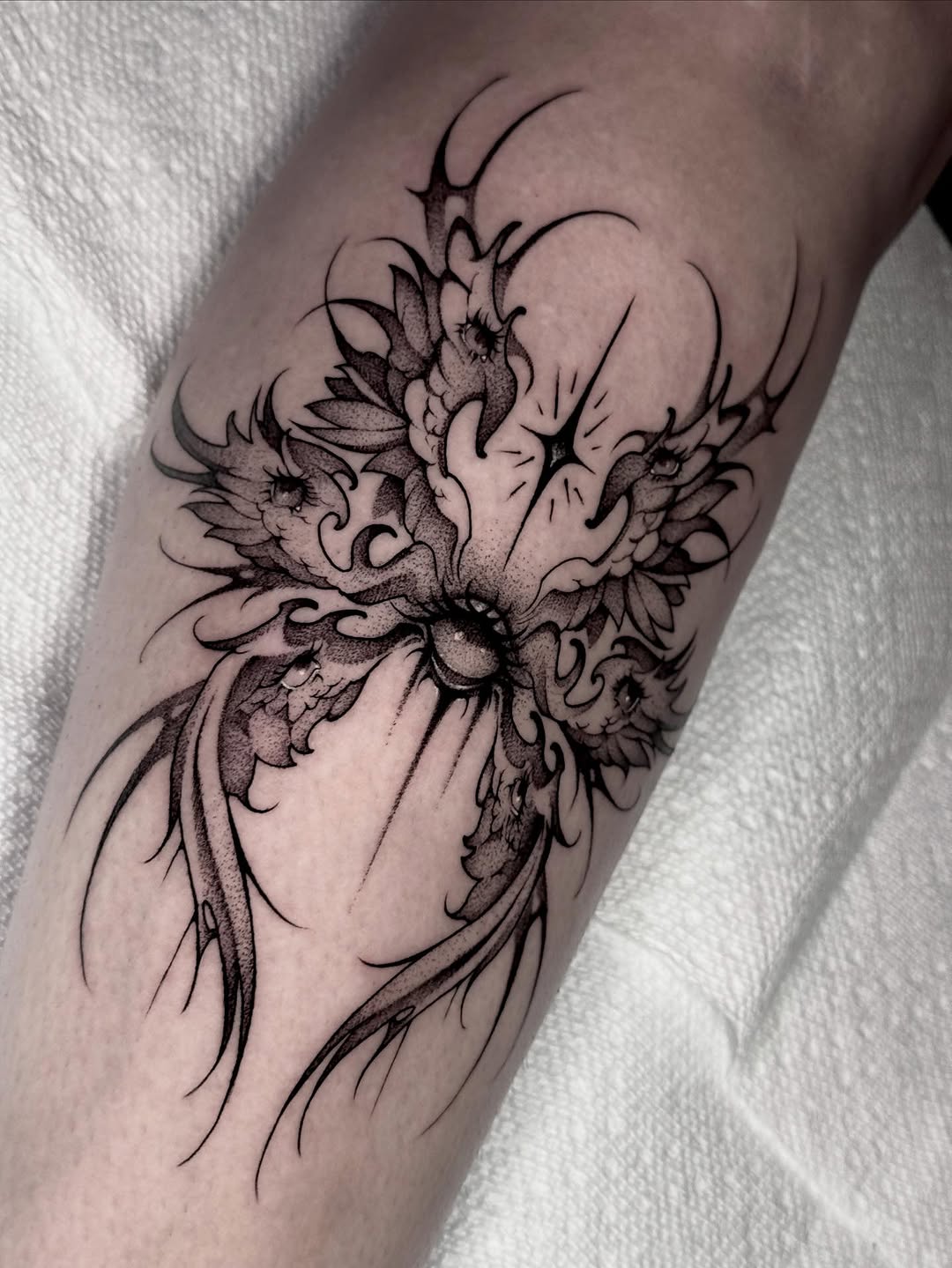 Tattoo by @xq.ink — blackwork, dotwork