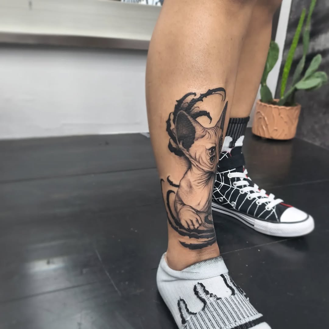 Tattoo by @_mujerdemuerte โ realism, black_and_grey