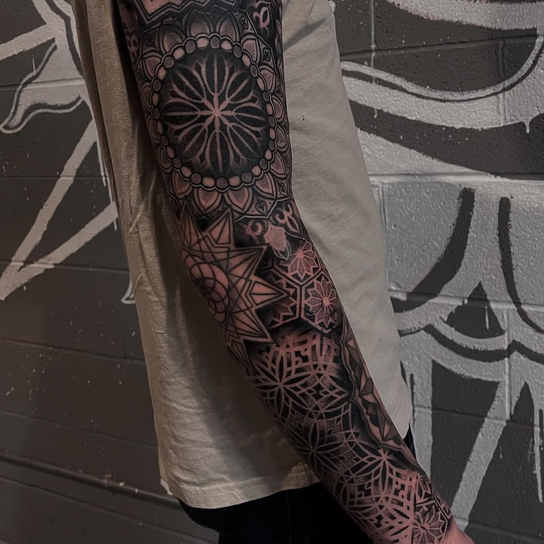 Tattoo by @slim_reaper_tattoos — geometric, blackwork
