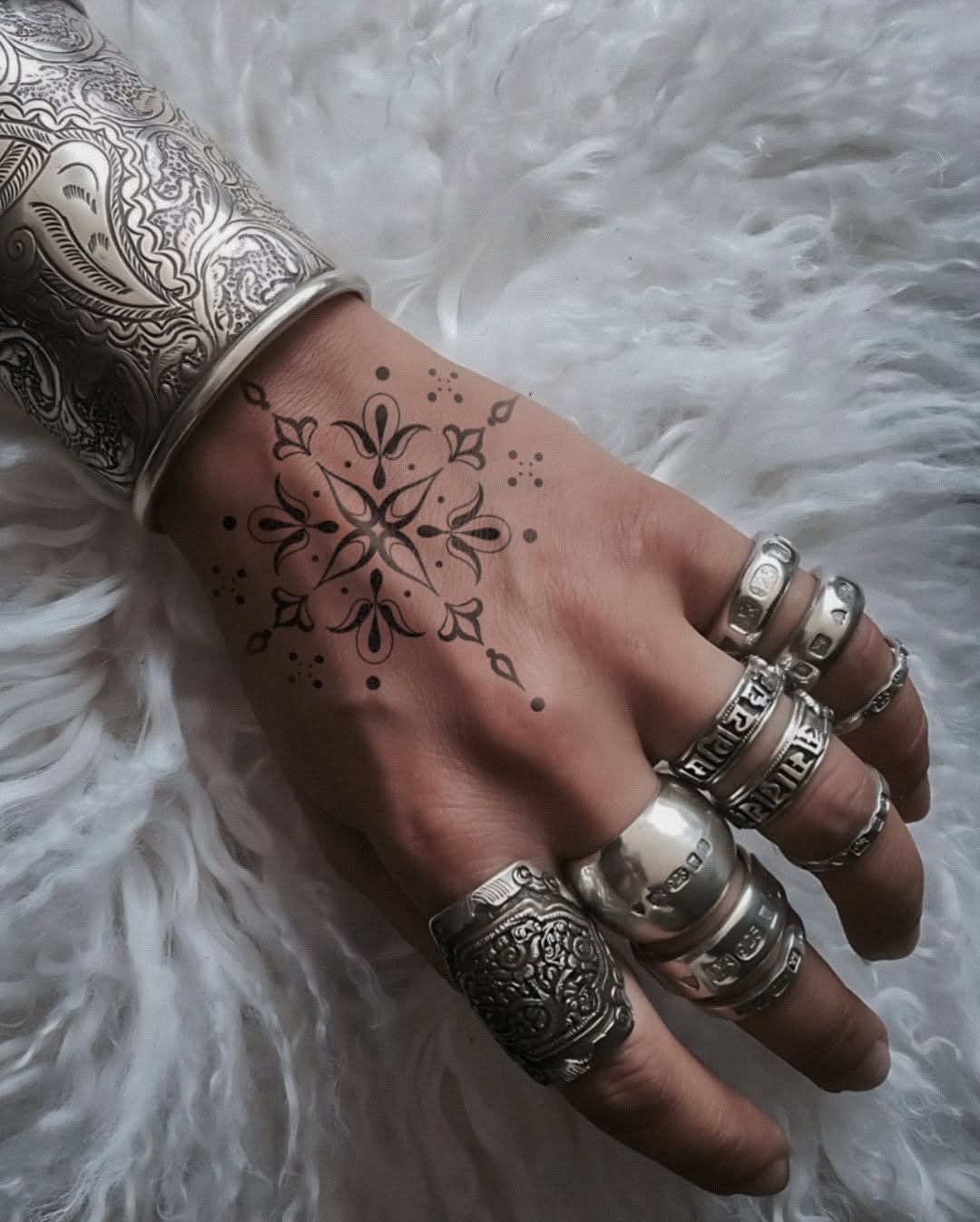 Tattoo by @driftwood.ttt — geometric, dotwork