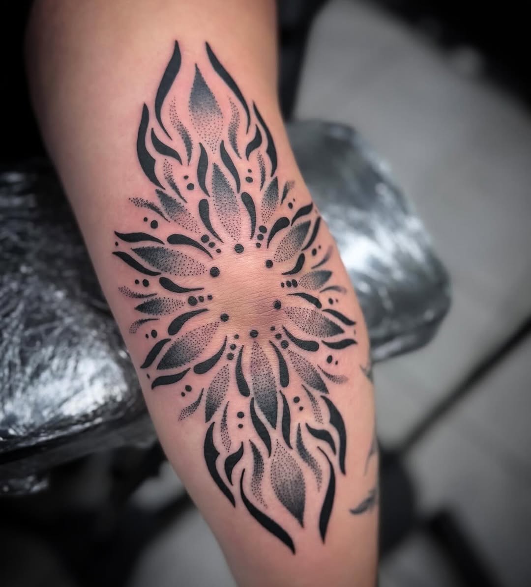 Tattoo by @mcglonetattoos — dotwork, ornamental