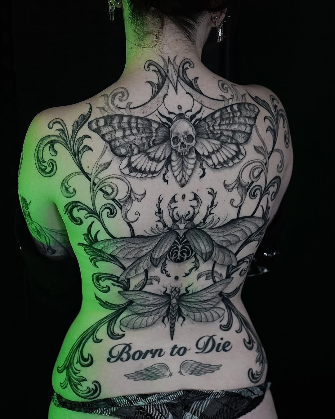 Tattoo by @evi_berry_falcon โ realism, black_and_grey
