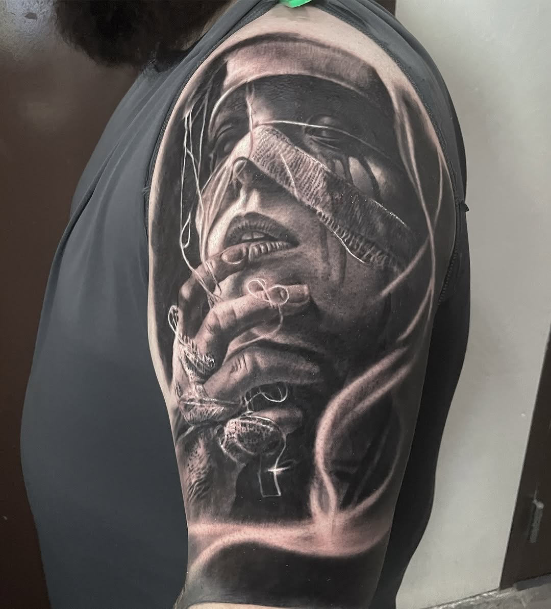 Tattoo by @kaostattooart — realism, black_and_grey