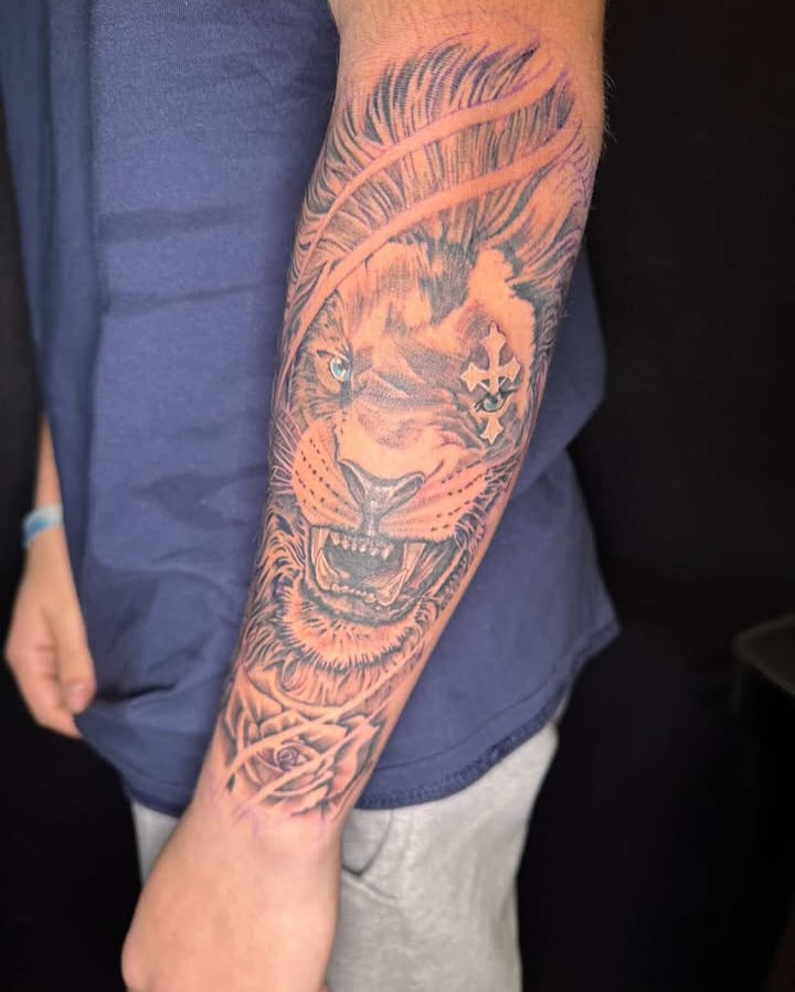 Tattoo by @tattoos_by_brett — realism, black_and_grey