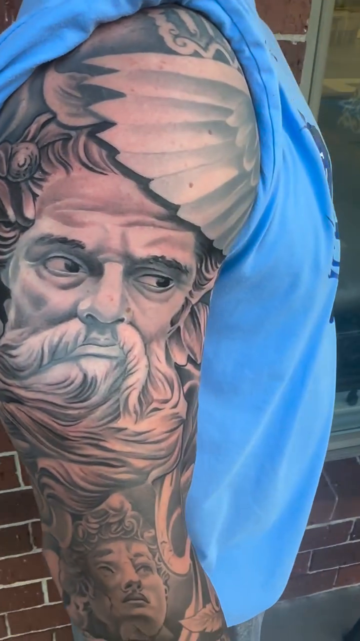 Tattoo by @omarrodrigueztattoo — realism, black_and_grey