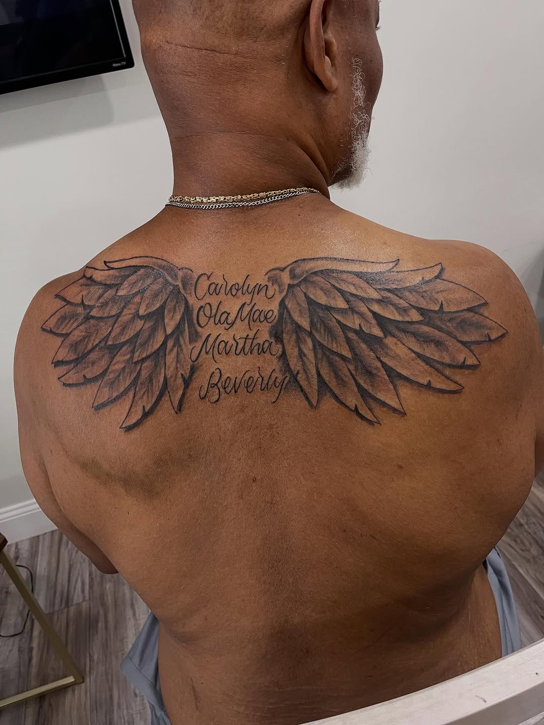 Tattoo by @da_madtatter — lettering_script, black_and_grey