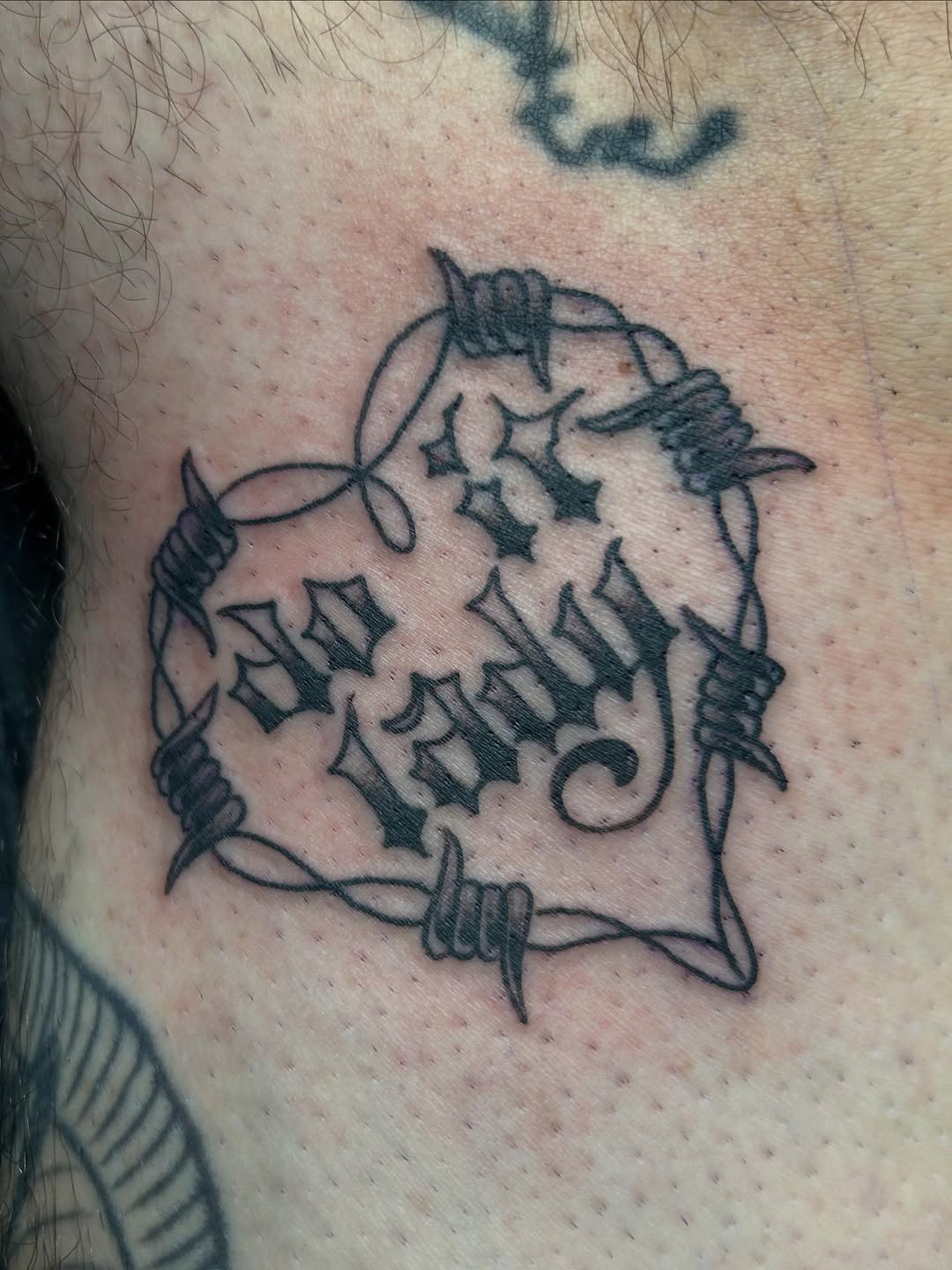 Tattoo by @electric_phantom — lettering_script, blackwork