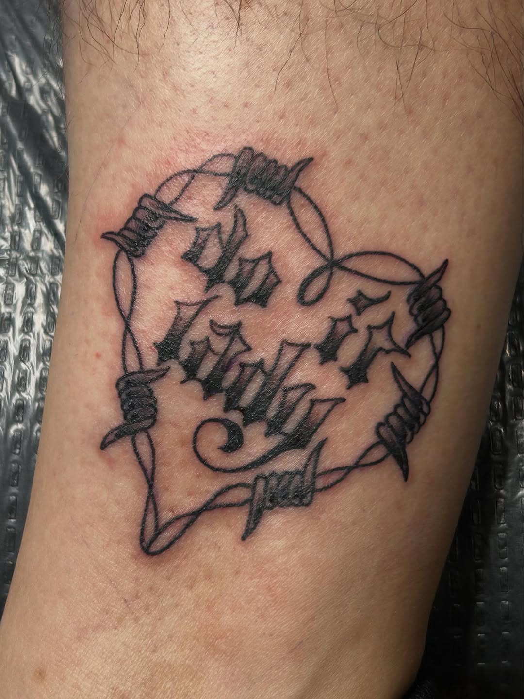 Tattoo by @electric_phantom — lettering_script, blackwork