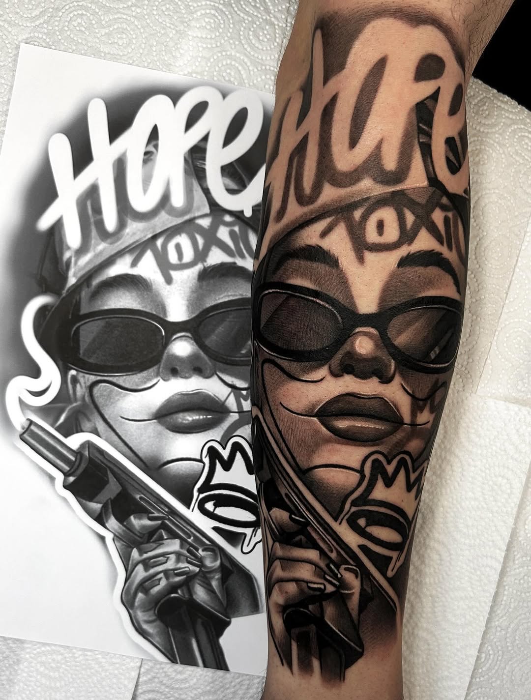 Tattoo by @harveyztattooz — chicano, black_and_grey