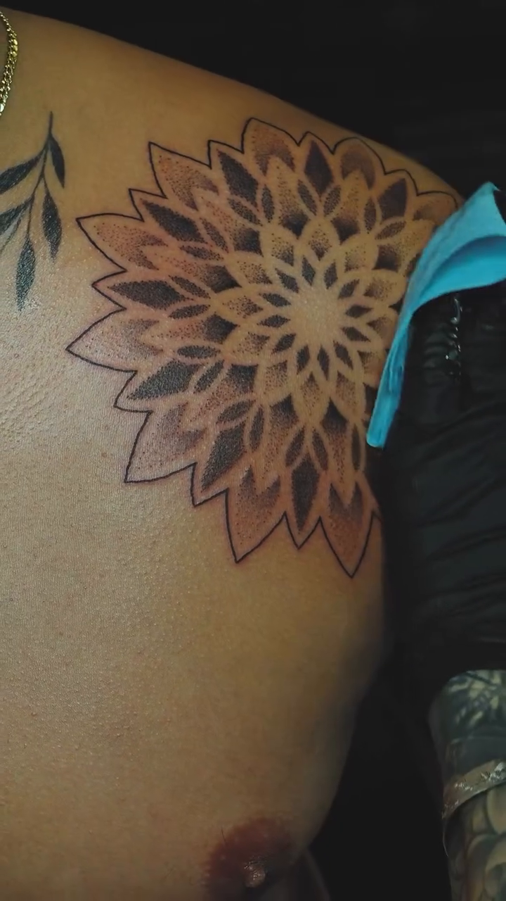 Tattoo by @xtina.inks — dotwork, geometric