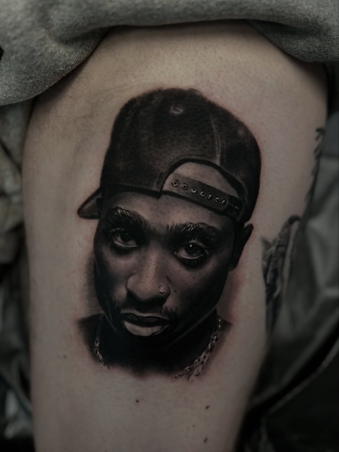 Tattoo by @carter.studios.ink โ realism, black_and_grey