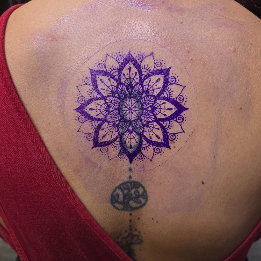 Tattoo by @inked.by.rose — geometric, dotwork