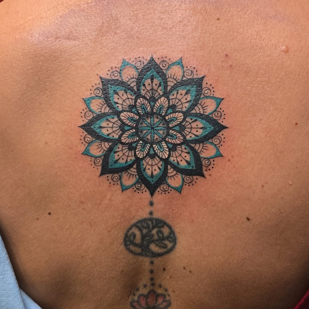 Tattoo by @inked.by.rose — geometric, dotwork